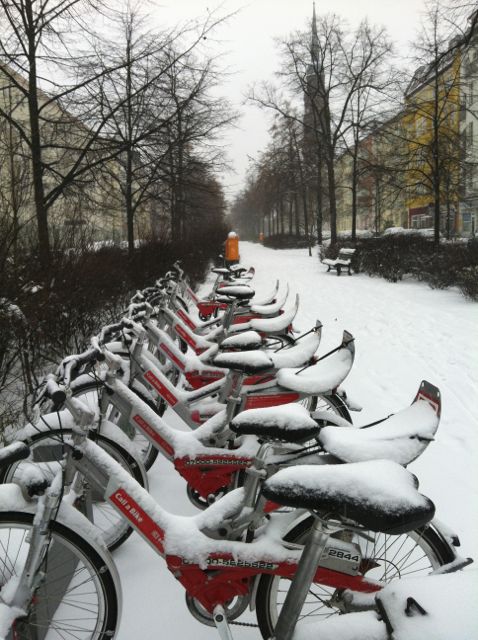 Berlin City Bikes covered in snow